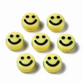 Abalorios amarillos con caritas felices.